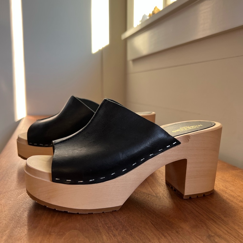 Swedish Hasbeens classic platform open toe slip on.